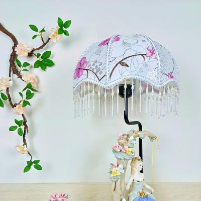 ĐÈN PHONG CÁCH CHÂU ÂU – CÔ GÁI NGỒI XÍCH ĐU